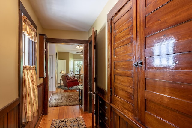 331 Rte 100 N, Plymouth, VT 05056 - corridor featuring light wood-type flooring and wainscoting