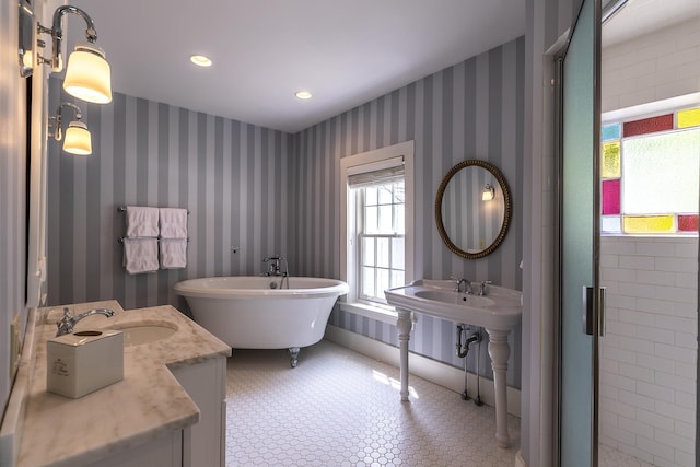 331 Rte 100 N, Plymouth, VT 05056 - full bath featuring plenty of natural light, a freestanding tub, and recessed lighting