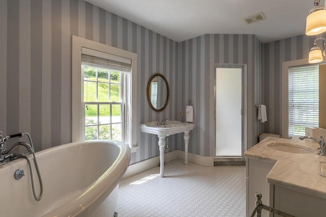 331 Rte 100 N, Plymouth, VT 05056 - full bath with a sink and a freestanding tub