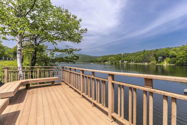 331 Rte 100 N, Plymouth, VT 05056 - wooden deck featuring a water view and a forest view