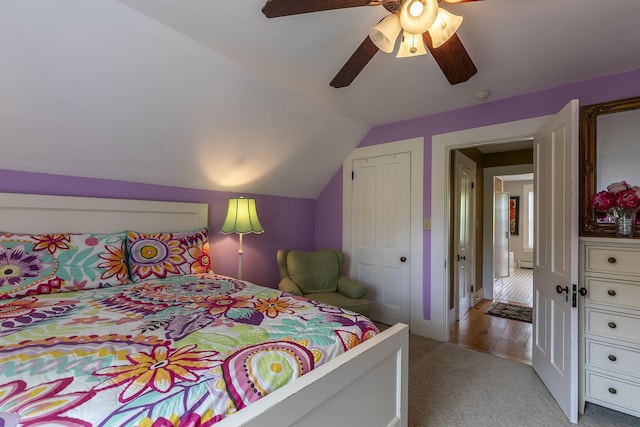 331 Rte 100 N, Plymouth, VT 05056 - bedroom featuring vaulted ceiling, light carpet, a ceiling fan, and baseboard heating