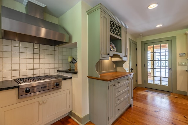 331 Rte 100 N, Plymouth, VT 05056 - kitchen featuring wall chimney exhaust hood, stainless steel gas stovetop, decorative backsplash, light wood-type flooring, and recessed lighting
