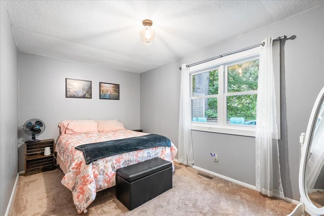 155 Woodcrest Cir, Milton, VT 05468 - carpeted bedroom with a textured ceiling and baseboards