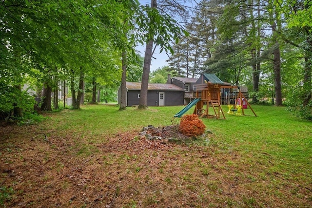 155 Woodcrest Cir, Milton, VT 05468 - view of grassy yard with a playground