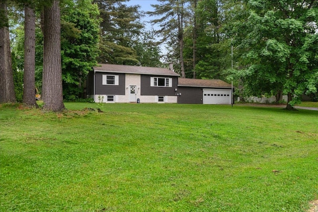 155 Woodcrest Cir, Milton, VT 05468 - raised ranch featuring a garage, a front yard, and a chimney