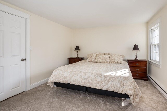 8 Woodridge Rd, Durham, NH 03824 - bedroom featuring baseboard heating and carpet floors