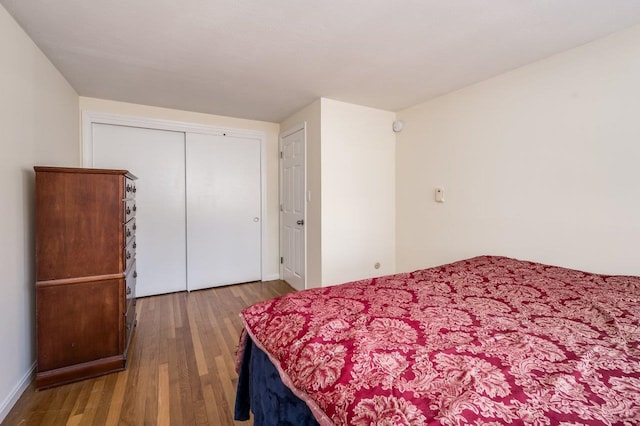 8 Woodridge Rd, Durham, NH 03824 - bedroom with wood finished floors and a closet