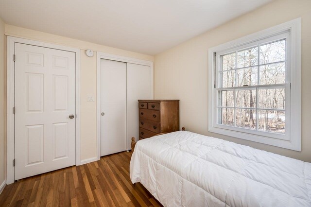 8 Woodridge Rd, Durham, NH 03824 - bedroom featuring wood finished floors and a closet