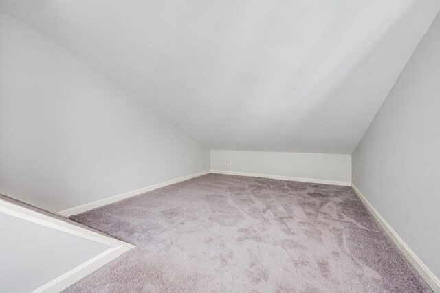 8 Woodridge Rd, Durham, NH 03824 - additional living space featuring lofted ceiling and carpet