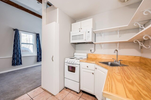 8 Woodridge Rd, Durham, NH 03824 - kitchen with white appliances, light carpet, open shelves, and white cabinets