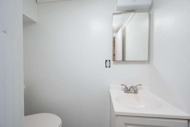 8 Woodridge Rd, Durham, NH 03824 - half bath featuring vanity and toilet