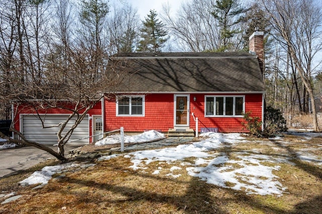8 Woodridge Rd, Durham, NH 03824 - colonial inspired home with roof with shingles, entry steps, a garage, a chimney, and asphalt driveway