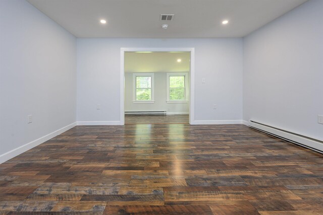 222 Daniel Webster Hwy, Boscawen, NH 03303 - empty room featuring a baseboard radiator, wood finished floors, and recessed lighting