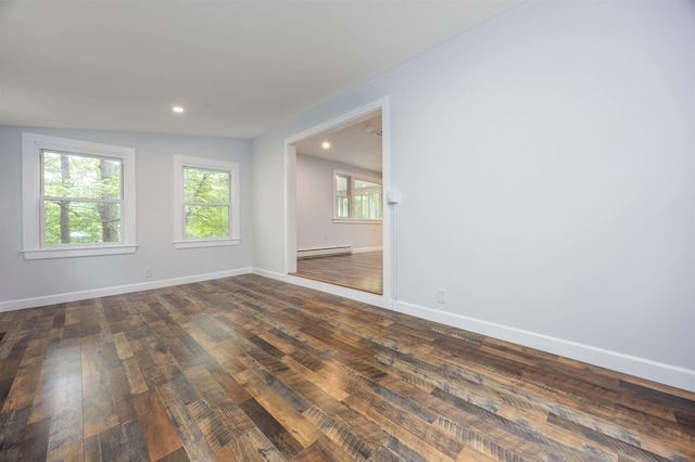 222 Daniel Webster Hwy, Boscawen, NH 03303 - empty room featuring baseboard heating, dark wood-style flooring, and recessed lighting