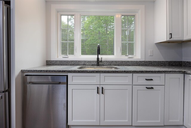 222 Daniel Webster Hwy, Boscawen, NH 03303 - kitchen featuring stainless steel appliances, plenty of natural light, white cabinets, and dark stone countertops
