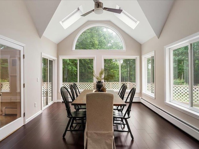 71 Marblehead Rd, Windham, NH 03087 - dining room featuring a skylight, baseboard heating, a ceiling fan, dark wood-style floors, and high vaulted ceiling