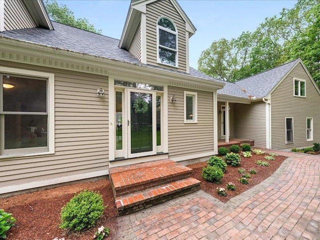 71 Marblehead Rd, Windham, NH 03087 - view of exterior entry with roof with shingles