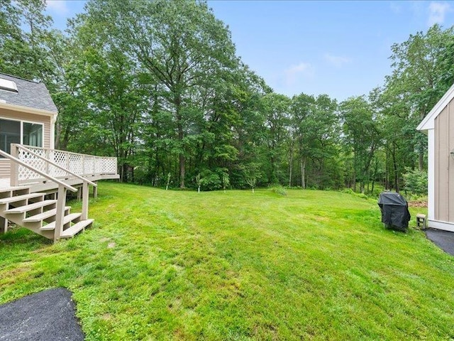 71 Marblehead Rd, Windham, NH 03087 - view of green lawn featuring stairs and a wooden deck