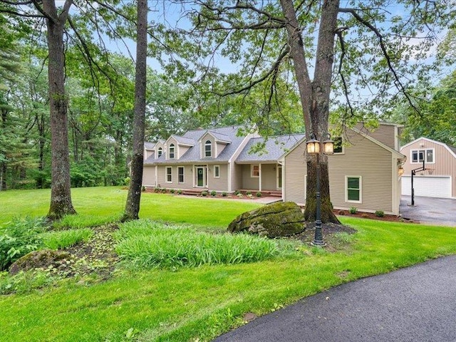71 Marblehead Rd, Windham, NH 03087 - new england style home featuring a garage, a front yard, an outdoor structure, and driveway