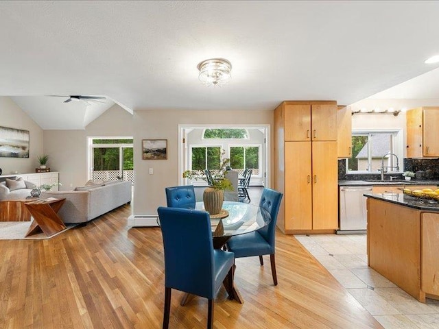 71 Marblehead Rd, Windham, NH 03087 - dining area featuring plenty of natural light, a baseboard heating unit, vaulted ceiling, and a ceiling fan