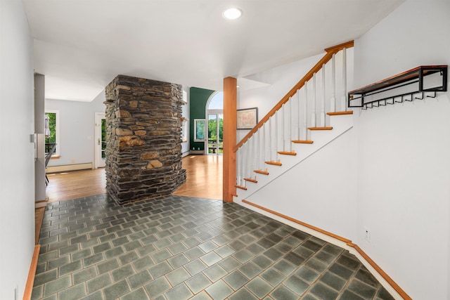 650 Perry Lea Rd, Waterbury, VT 05676 - staircase with plenty of natural light, baseboard heating, decorative columns, and recessed lighting