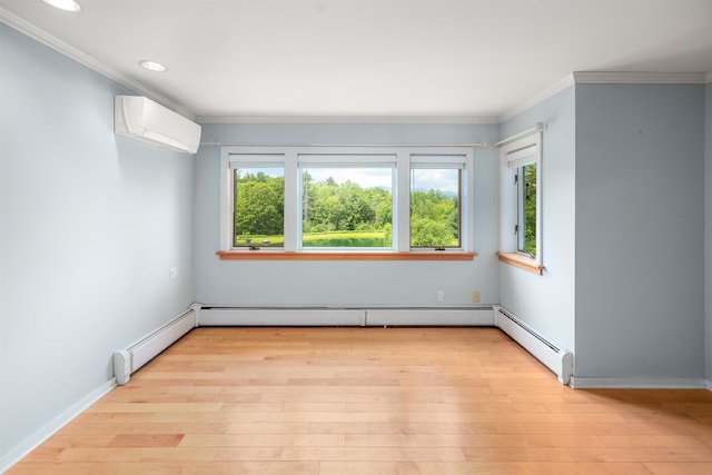 650 Perry Lea Rd, Waterbury, VT 05676 - unfurnished room featuring an AC wall unit, light wood-type flooring, crown molding, and recessed lighting