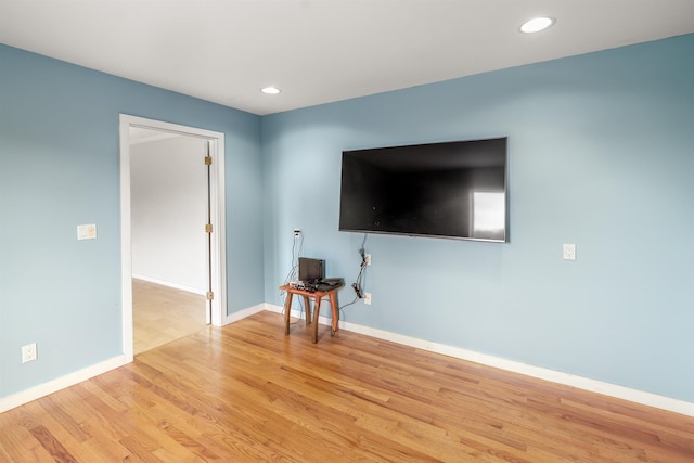650 Perry Lea Rd, Waterbury, VT 05676 - unfurnished living room with wood finished floors and recessed lighting