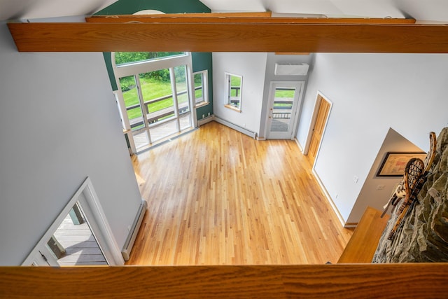 650 Perry Lea Rd, Waterbury, VT 05676 - living room with baseboard heating and light wood-type flooring