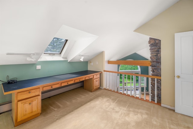 650 Perry Lea Rd, Waterbury, VT 05676 - unfurnished office featuring a baseboard heating unit, a skylight, rail lighting, light carpet, and lofted ceiling
