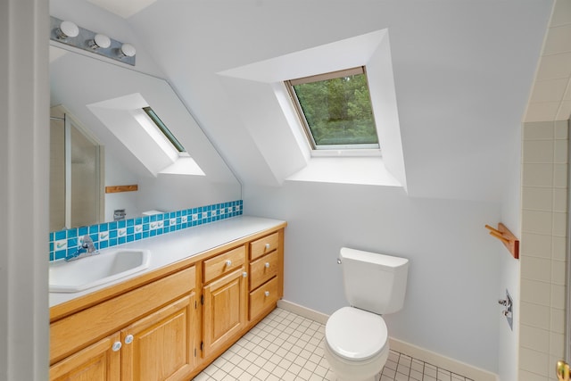 650 Perry Lea Rd, Waterbury, VT 05676 - bathroom with a skylight, vanity, an enclosed shower, and tile patterned floors