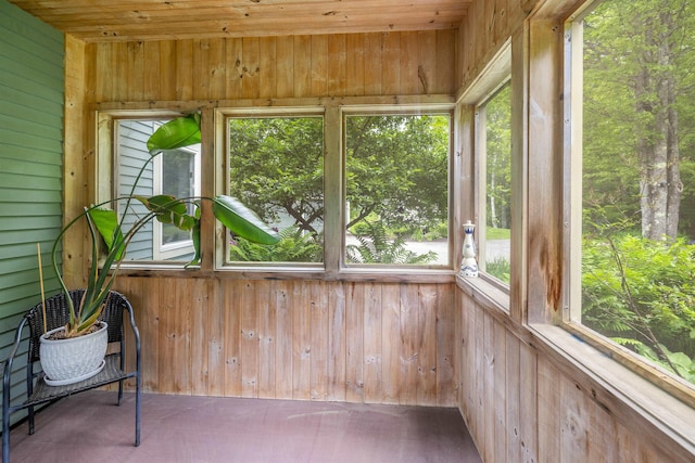 650 Perry Lea Rd, Waterbury, VT 05676 - unfurnished sunroom featuring wooden walls and wood ceiling