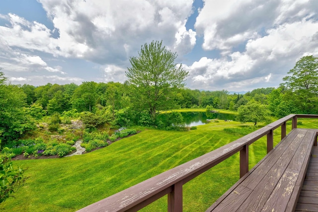650 Perry Lea Rd, Waterbury, VT 05676 - deck with a water view and a yard
