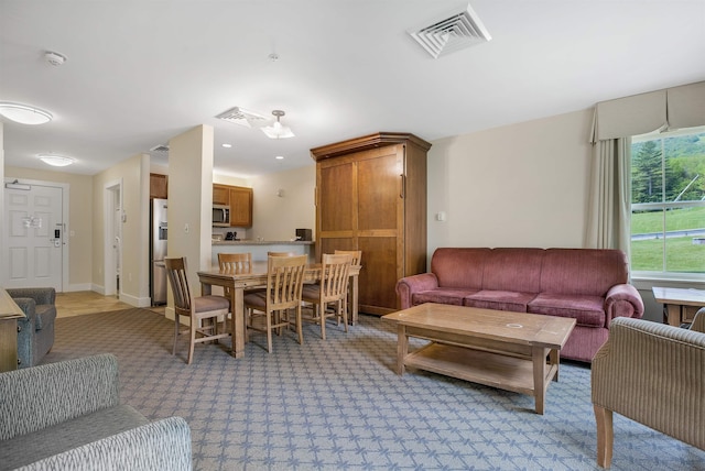 517-519 Jackson Gore Rd Unit 517-519Qtr I, Ludlow, VT 05149 - living room featuring light carpet