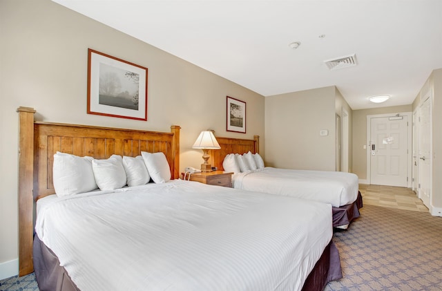517-519 Jackson Gore Rd Unit 517-519Qtr I, Ludlow, VT 05149 - bedroom featuring light carpet and baseboards