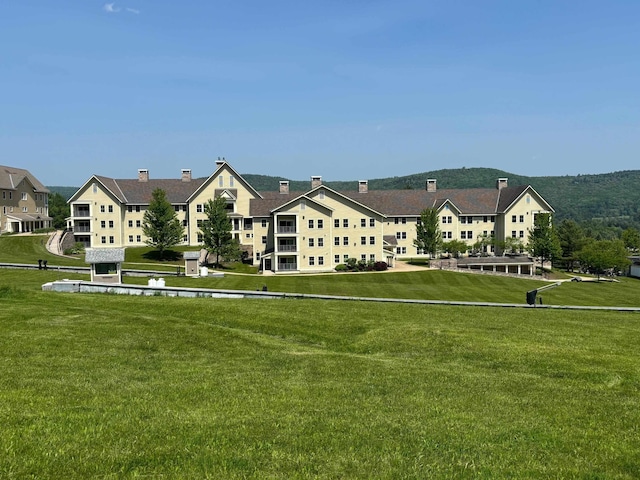 517-519 Jackson Gore Rd Unit 517-519Qtr I, Ludlow, VT 05149 - view of property's community featuring a yard