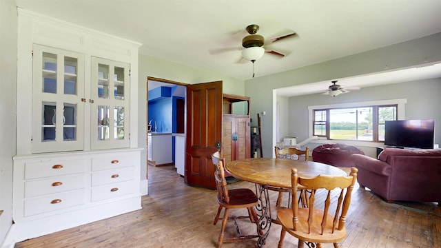 180 E Shore S, Grand Isle, VT 05458 - dining area featuring a ceiling fan and light wood-style floors