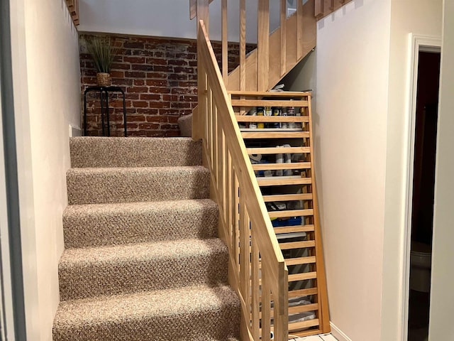 45 Kancamagus Hwy Unit 2, Woodstock, NH 03262 - staircase with brick wall