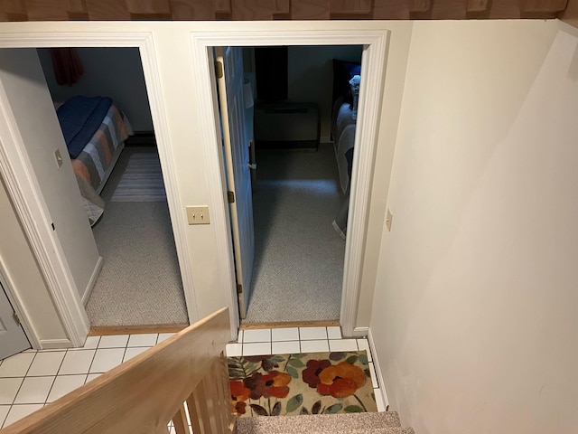 45 Kancamagus Hwy Unit 2, Woodstock, NH 03262 - stairs featuring carpet floors and tile patterned flooring