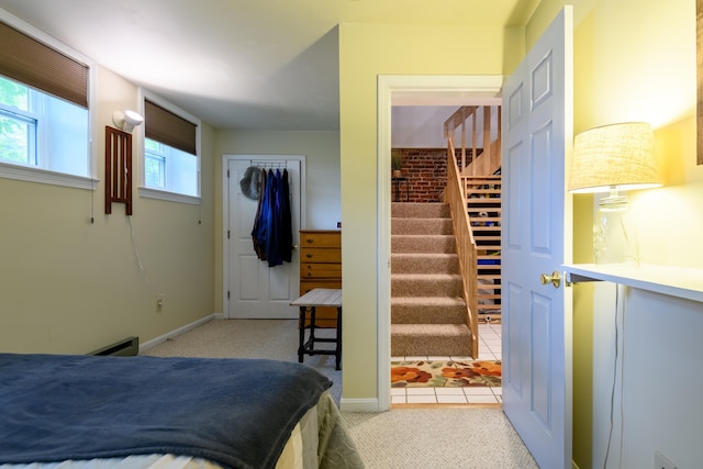 45 Kancamagus Hwy Unit 2, Woodstock, NH 03262 - carpeted bedroom featuring ensuite bathroom and baseboards