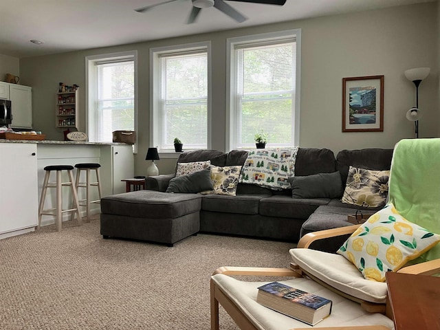 45 Kancamagus Hwy Unit 2, Woodstock, NH 03262 - living room featuring a ceiling fan and light carpet