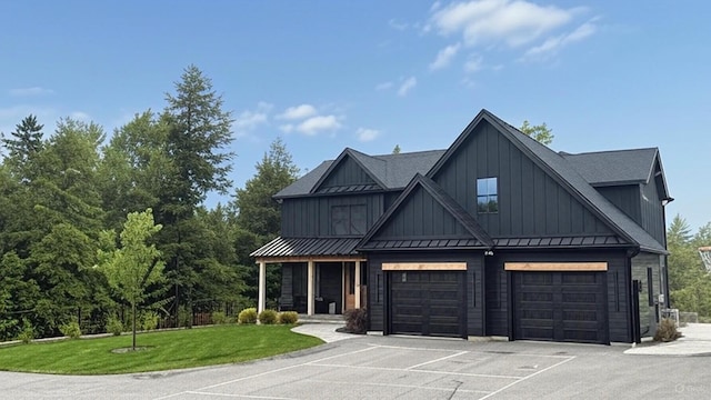 LOT12 Mark St, Rindge, NH 03461 - modern inspired farmhouse featuring board and batten siding, a front yard, asphalt driveway, a standing seam roof, and an attached garage