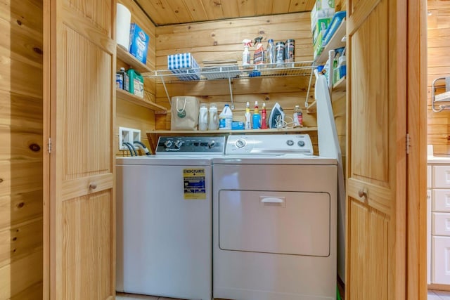 67 Cardinal Ln, Smithfield, ME 04978 - laundry area with washing machine and clothes dryer and wooden walls
