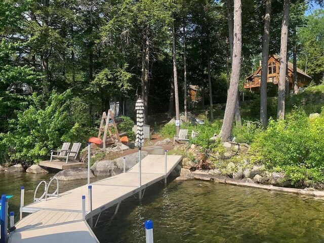 67 Cardinal Ln, Smithfield, ME 04978 - dock area featuring a water view and view of scattered trees