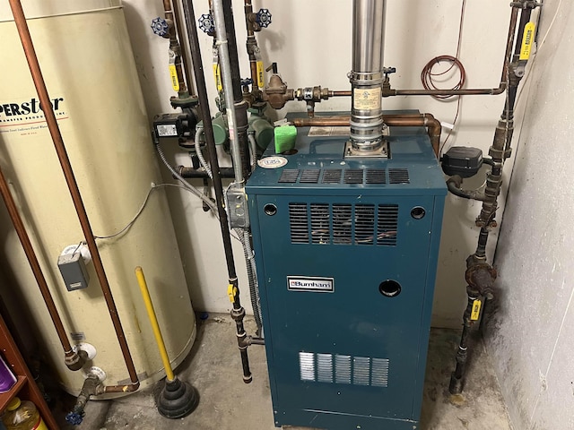 13 Bartlett St, Allenstown, NH 03275 - utility room with water heater and a heating unit