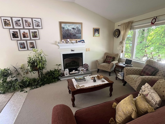 13 Bartlett St, Allenstown, NH 03275 - carpeted living area with a fireplace with raised hearth and lofted ceiling