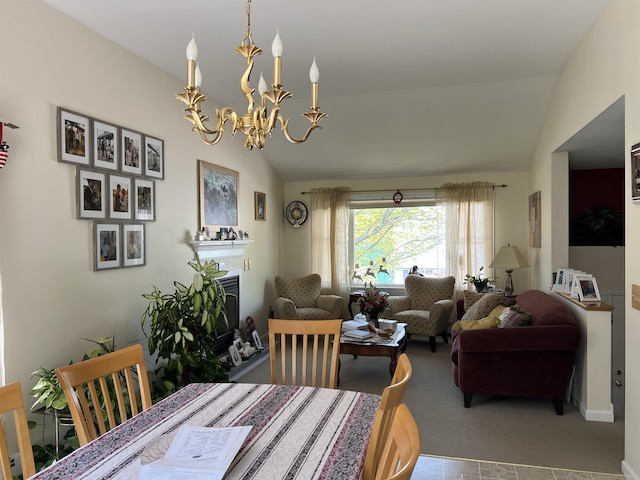 13 Bartlett St, Allenstown, NH 03275 - dining room with vaulted ceiling, a chandelier, and a fireplace