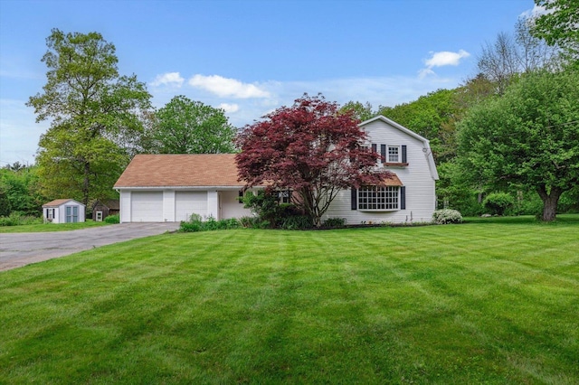 240 Middle Winchendon Rd, Rindge, NH 03461 - view of front of house featuring driveway, a garage, and a front yard