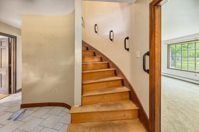 240 Middle Winchendon Rd, Rindge, NH 03461 - staircase with a baseboard heating unit and tile patterned flooring