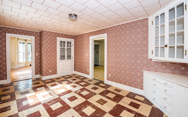 4 Walnut St, Exeter, NH 03833 - unfurnished dining area featuring ornamental molding and light floors