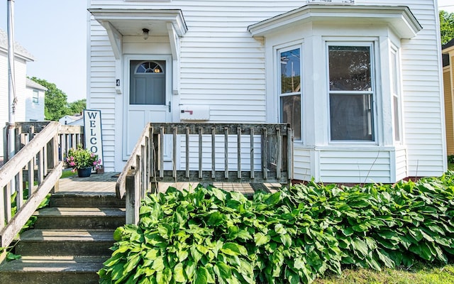 4 Walnut St, Exeter, NH 03833 - property entrance with a wooden deck